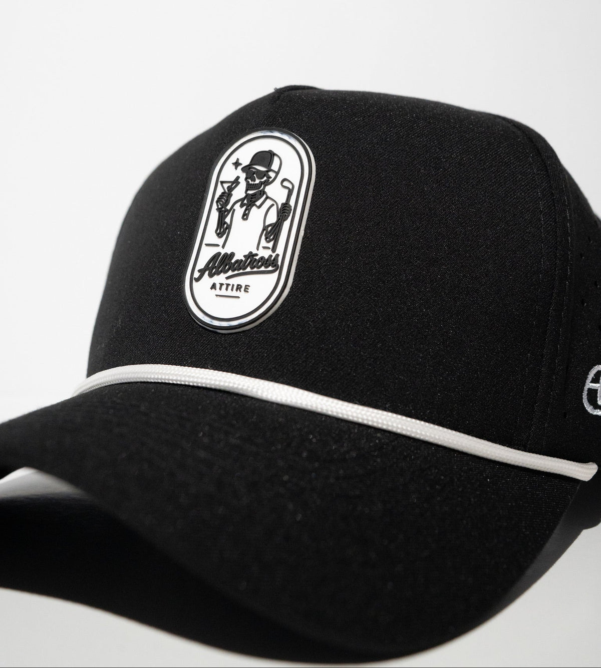 Three-quarter view of black Bones on the Green golf snapback