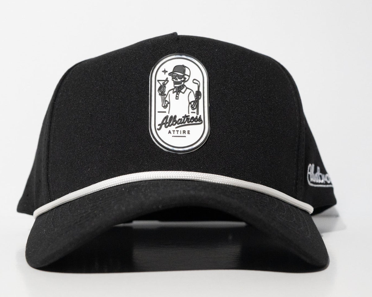A black baseball cap with a white embroidered oval logo on the front that reads 'Allathers Attire' and a white stripe along the edge of the brim, shown on a light gray background.